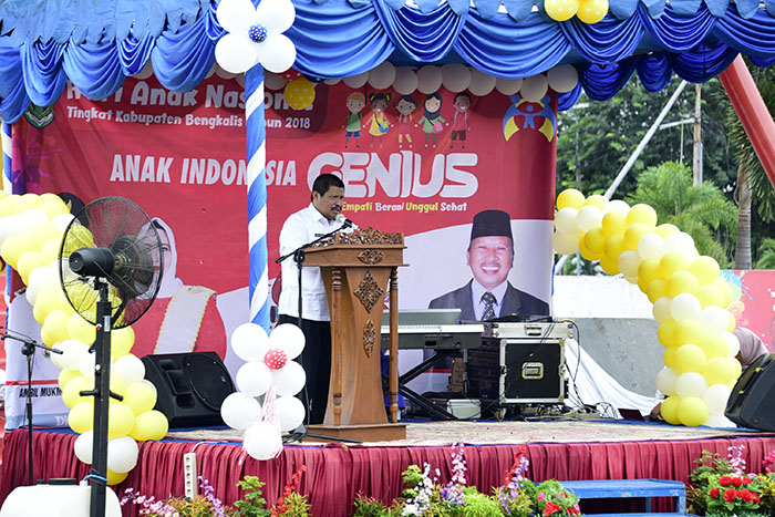 Teks foto: Bupati Bengkalis saat memberikan sambutan.